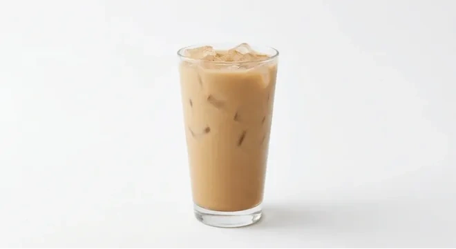 Starbucks US Iced Pumpkin Spice Latte (Grande), iced pumpkin spice latte over ice in a clear glass, nutrition and calories