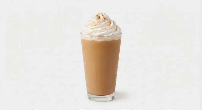 Starbucks US Pumpkin Spice Frappuccino (Grande), blended pumpkin spice coffee topped with whipped cream and spice in a clear glass, nutrition and calories