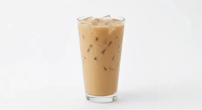 Starbucks US Iced Cinnamon Dolce Latte (Grande), iced latte over ice in a clear glass, nutrition and calories