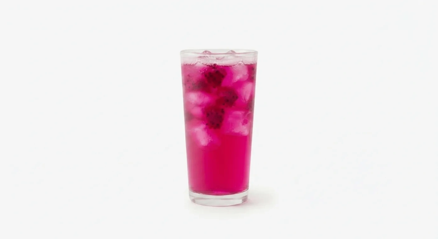 Starbucks US Mango Dragonfruit Refresher (Trenta), bright pink mango dragonfruit refresher with fruit pieces over ice in a tall glass, nutrition and calories