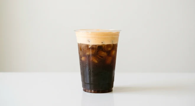 Starbucks US Orange Cream Cold Brew (Grande), cold brew topped with orange cold foam in a clear cup, nutrition and calories