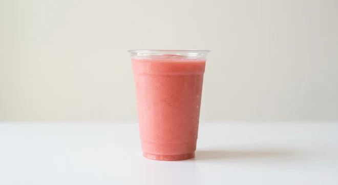 Starbucks US Strawberry Lemonade (Grande), blended pink strawberry lemonade in a clear cup, nutrition and calories