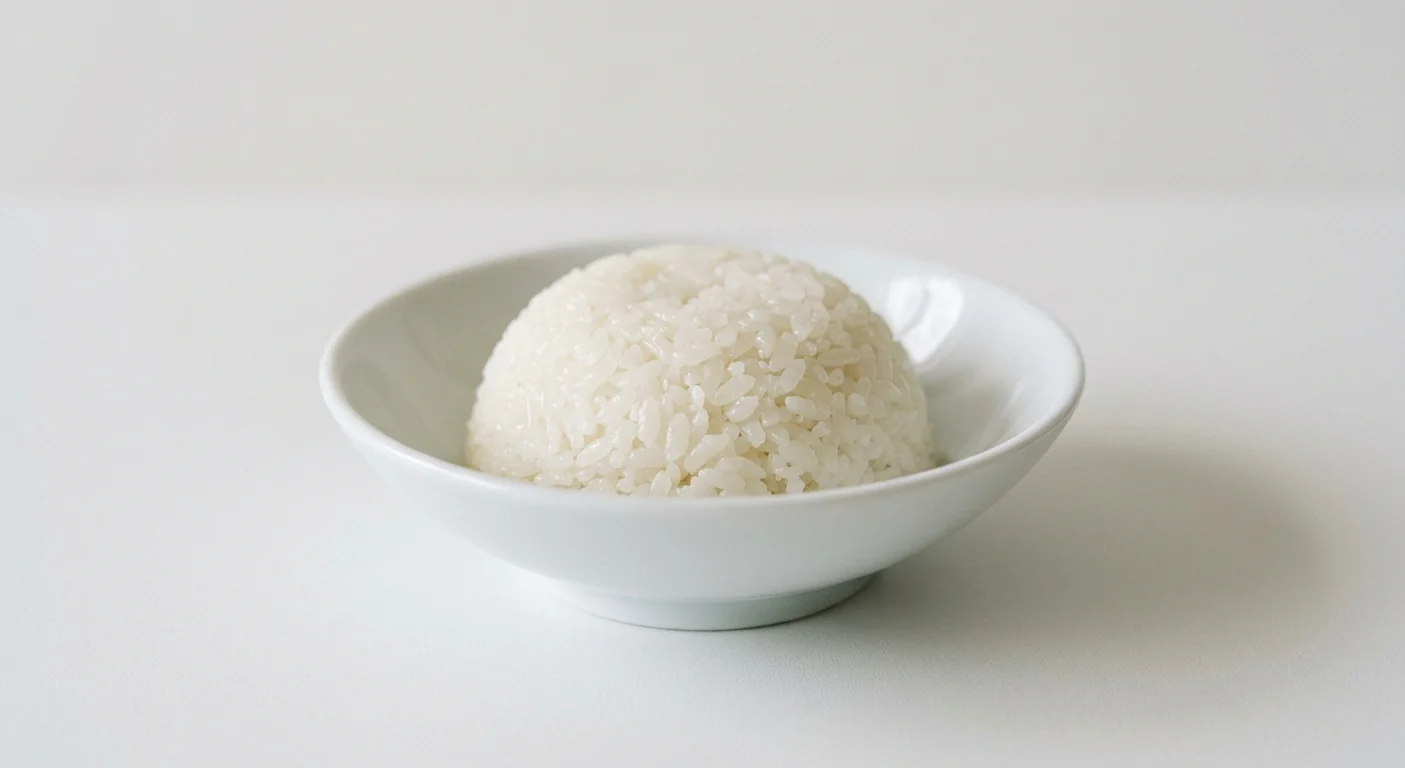 Wagamama Sticky Rice, a compact dome of glossy short-grain sticky white rice in a white bowl, nutrition and calories