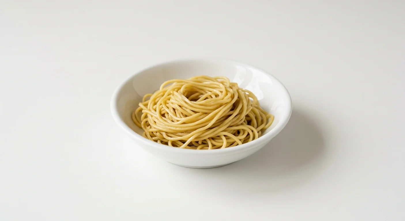 Wagamama Soba Noodles, a neat nest of plain thin wok-tossed yellow soba noodles in a white bowl, nutrition and calories