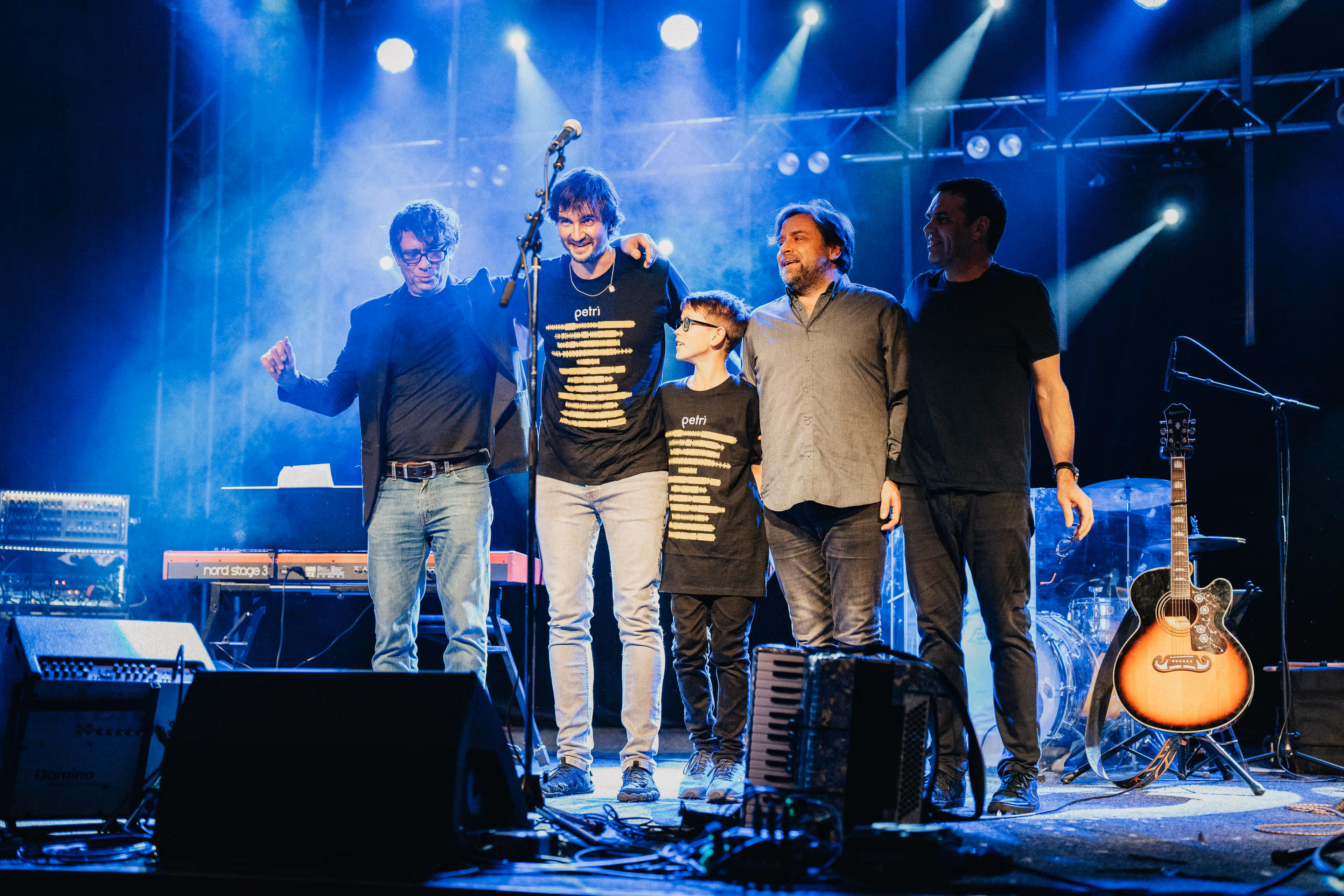 image of a live music performance at an outdoor festival