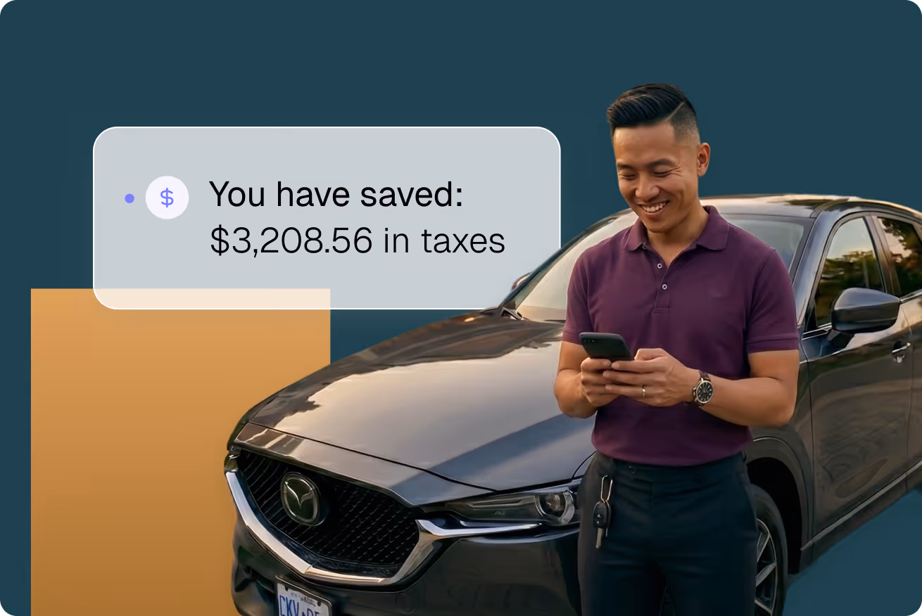 Smiling man in purple polo shirt using a smartphone while standing next to a black Mazda car with a text bubble stating savings of $3,208.56 in taxes.