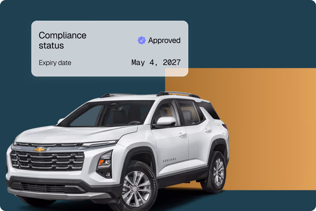 White Chevrolet SUV parked with a compliance status box showing approved and expiry date May 4, 2027.