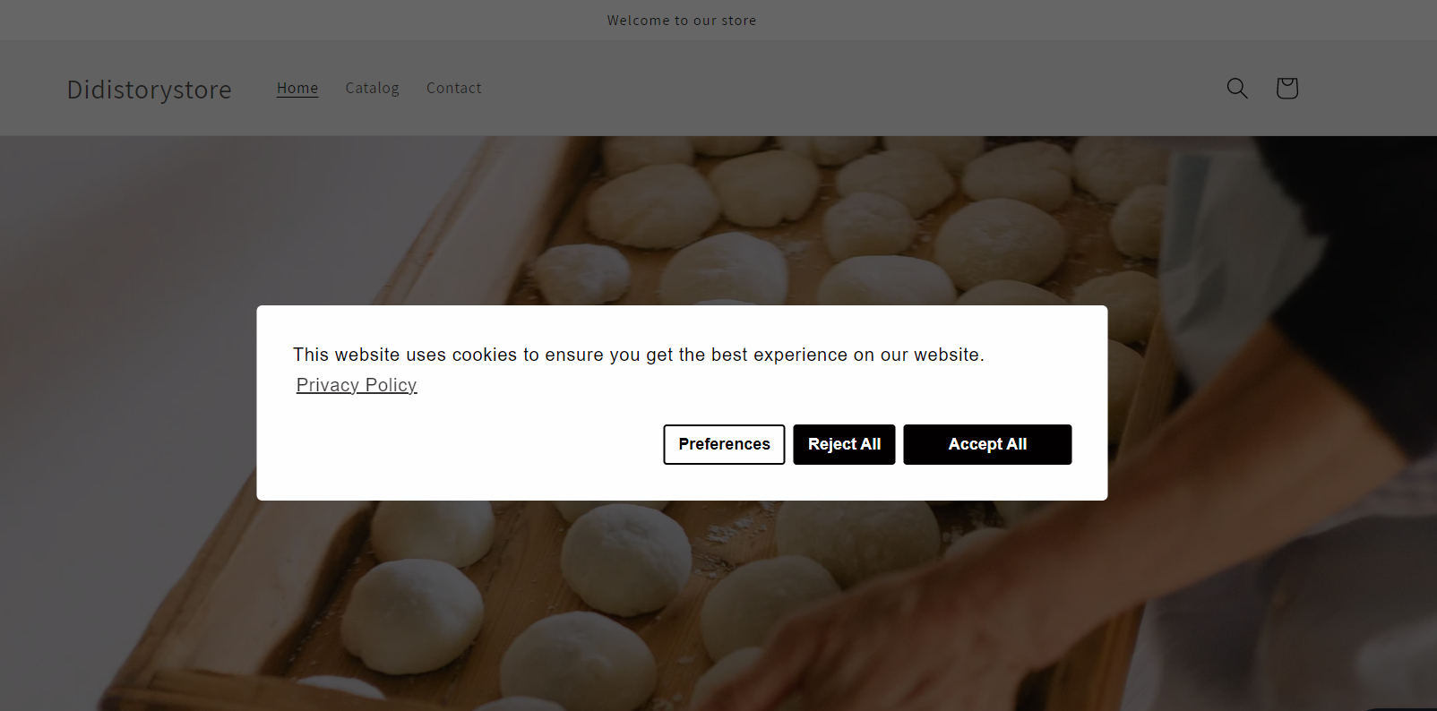 Cookie bar with "Reject All" and "Accept All" buttons