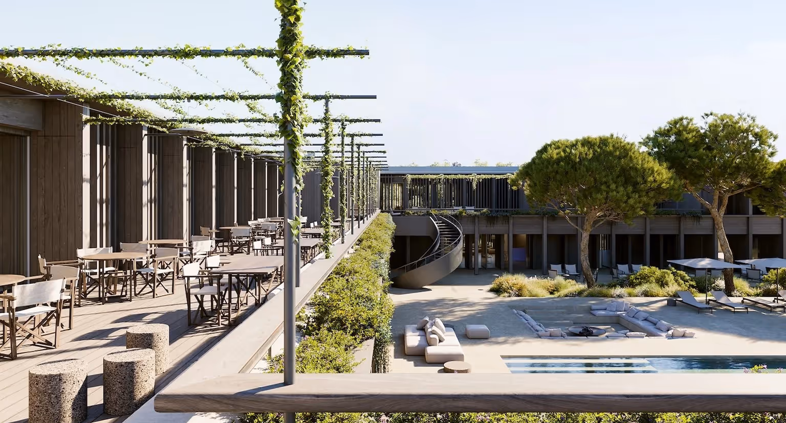 Outdoor terrace with tables, vines, lounge seating around a sunken firepit, pool, and trees in courtyard.