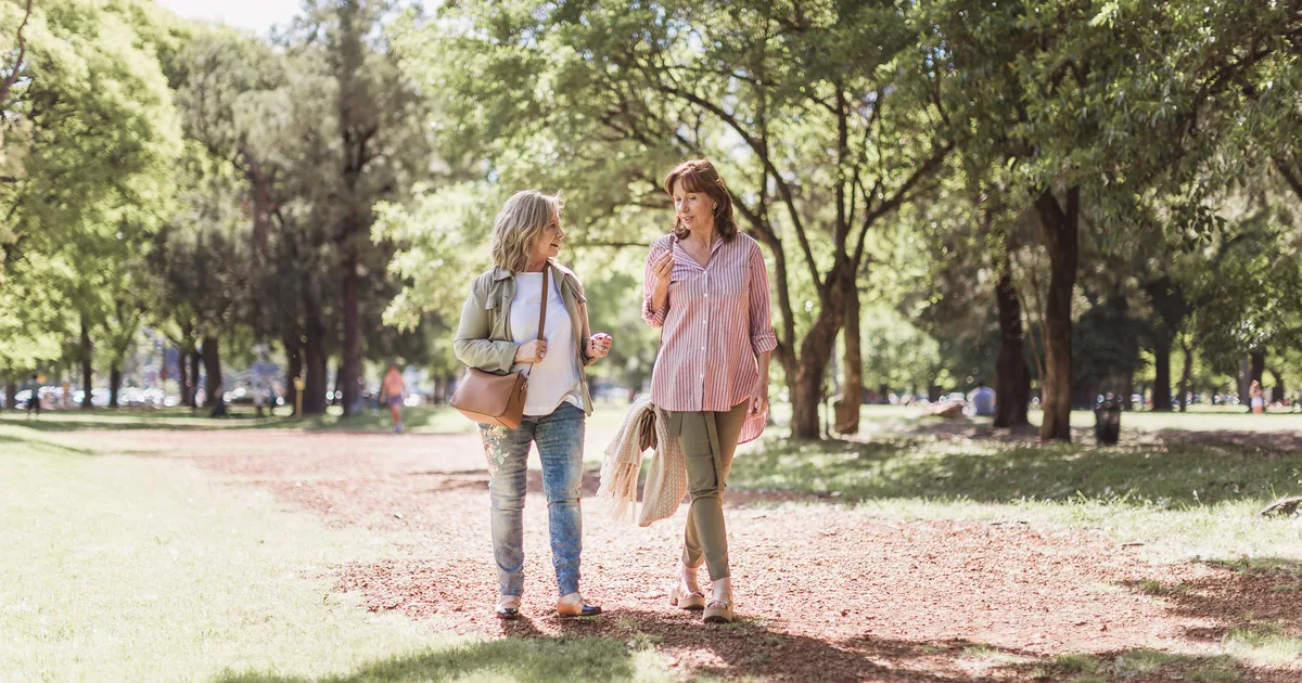 Senior women walking together in a park