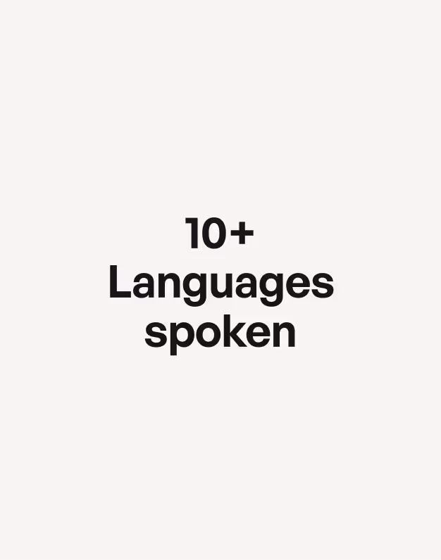Text reading '10+ Languages spoken' in bold black font on a light background.