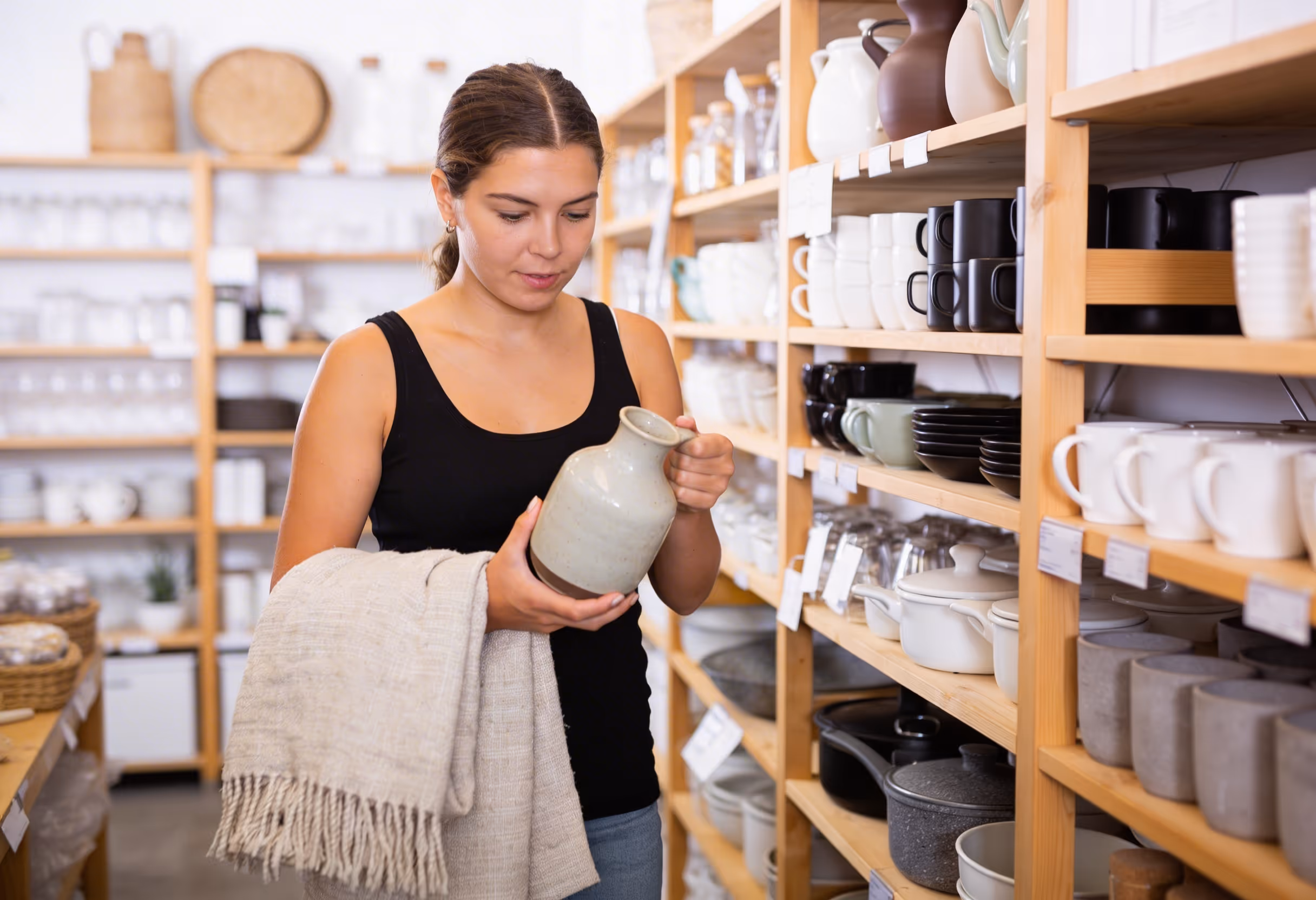 An industrial environment where a worker is analyzing a machine