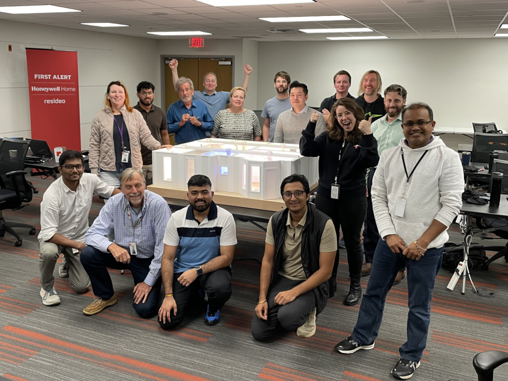 Resideo team members working together on innovative products