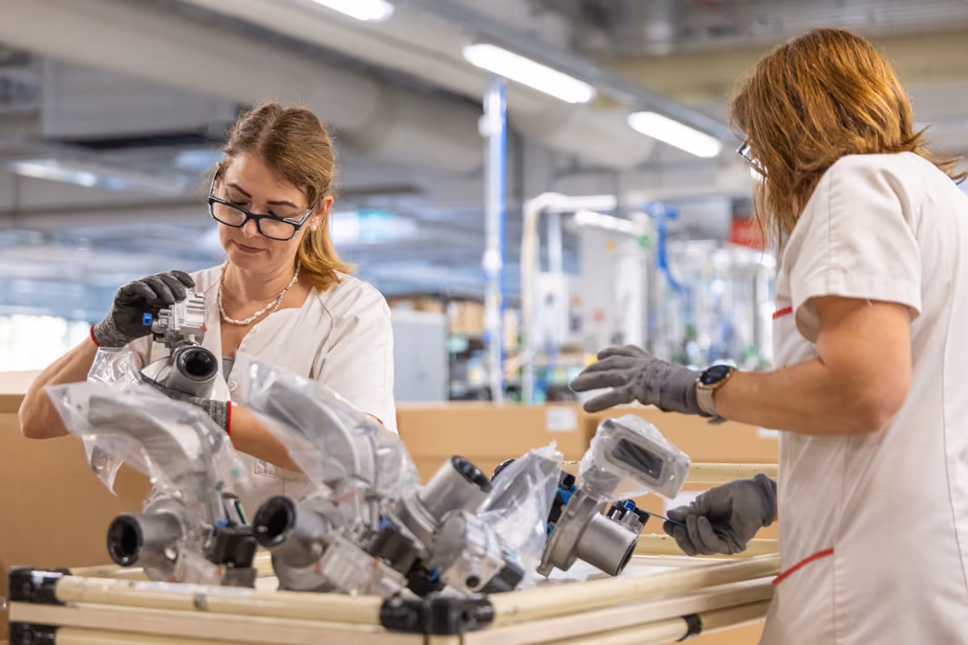 Supply chain and operations professionals at a Resideo facility