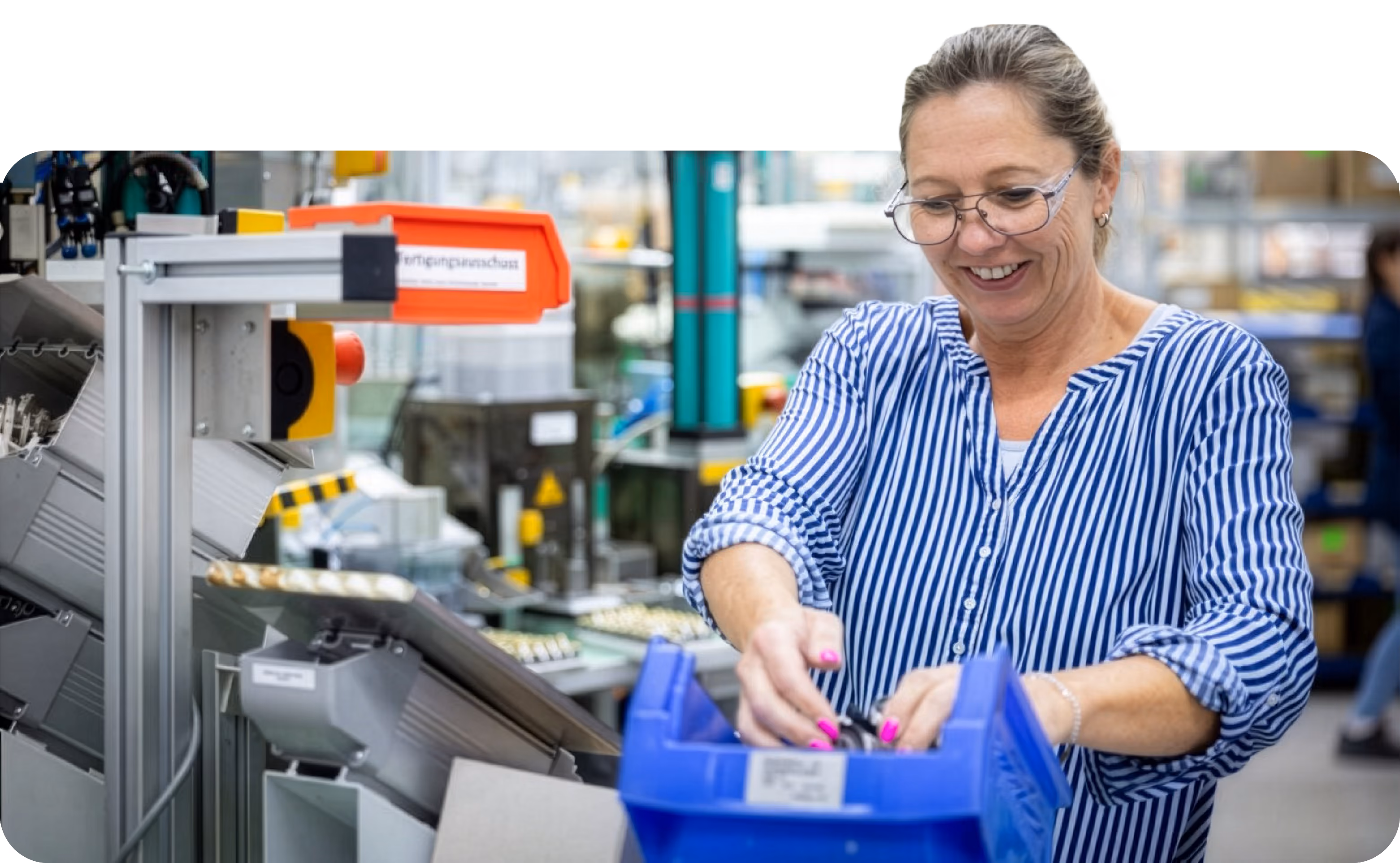 Resideo employee smiling in a professional workplace setting