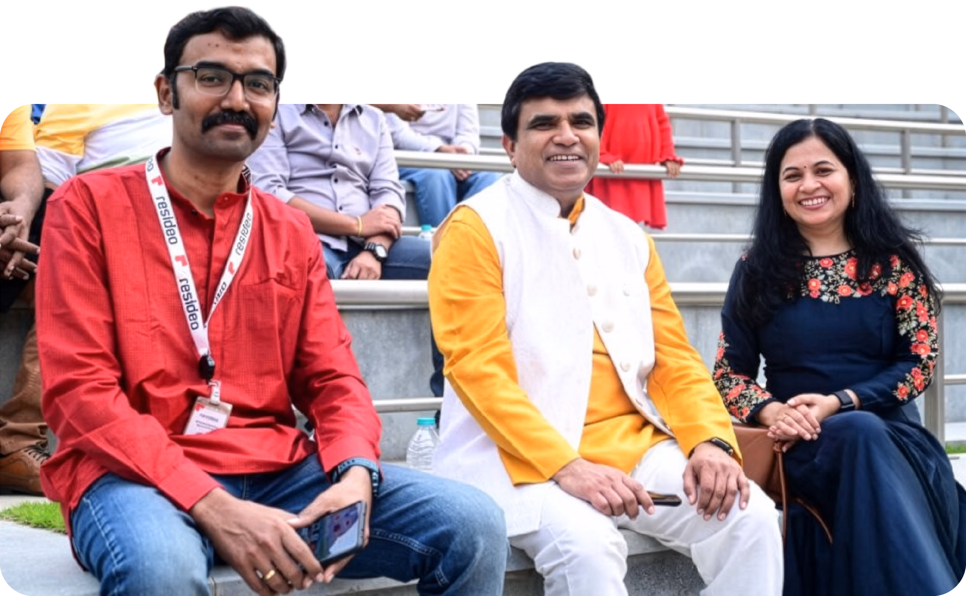 Diverse Resideo team members in a collaborative workplace setting
