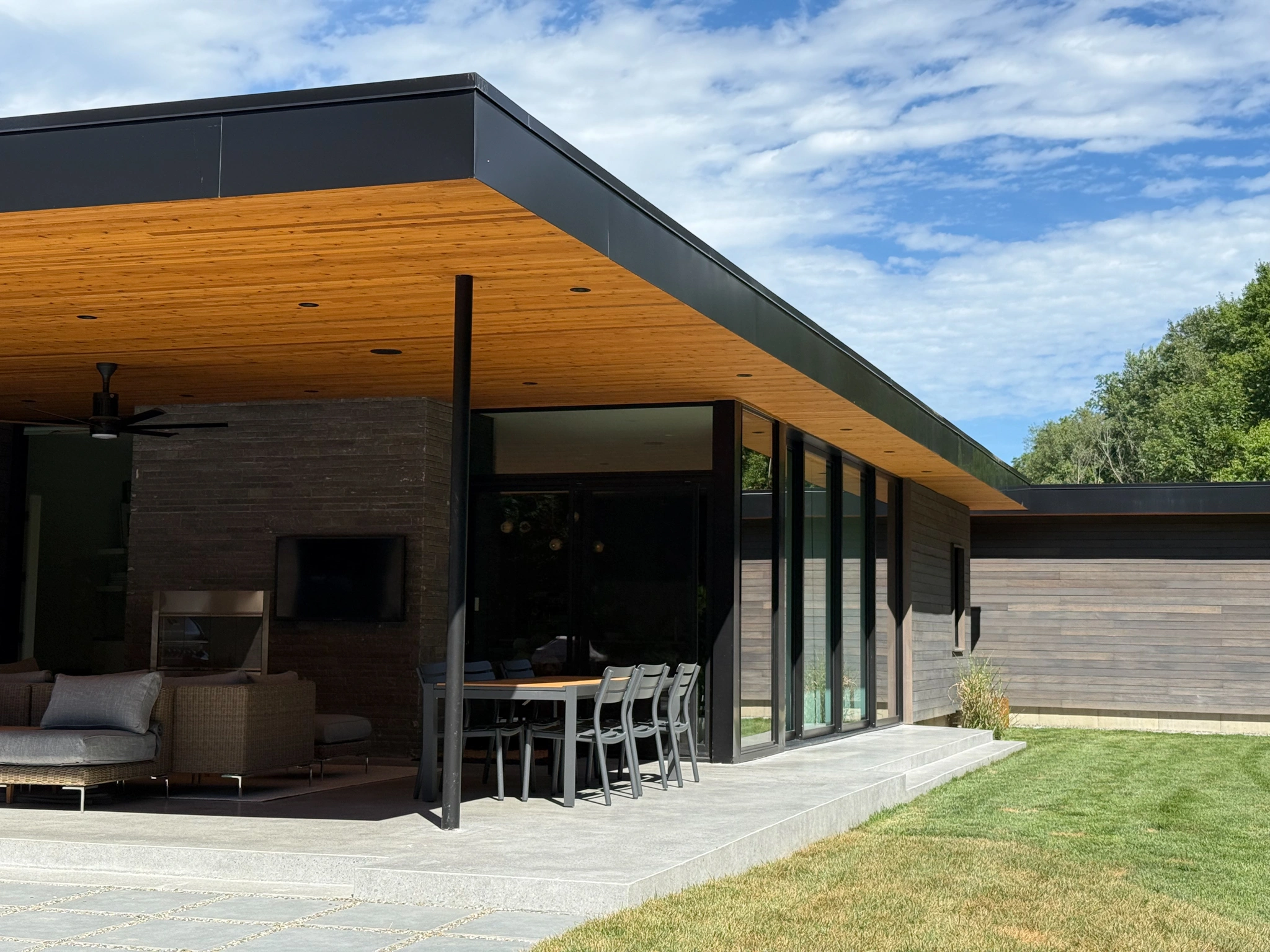 Modern home exterior with automated intelligent lighting design