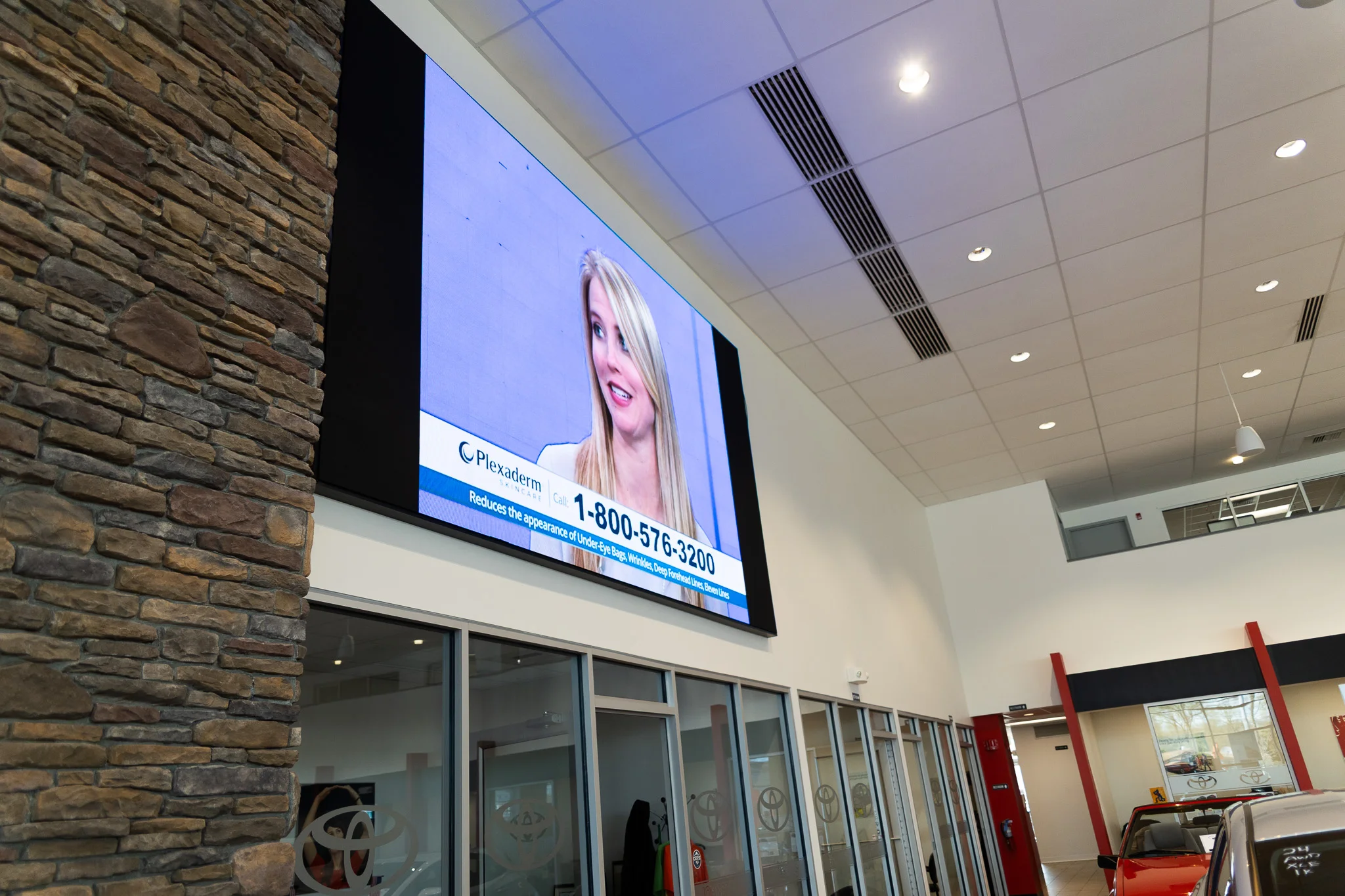 Video wall and intelligent lighting system in automotive showroom