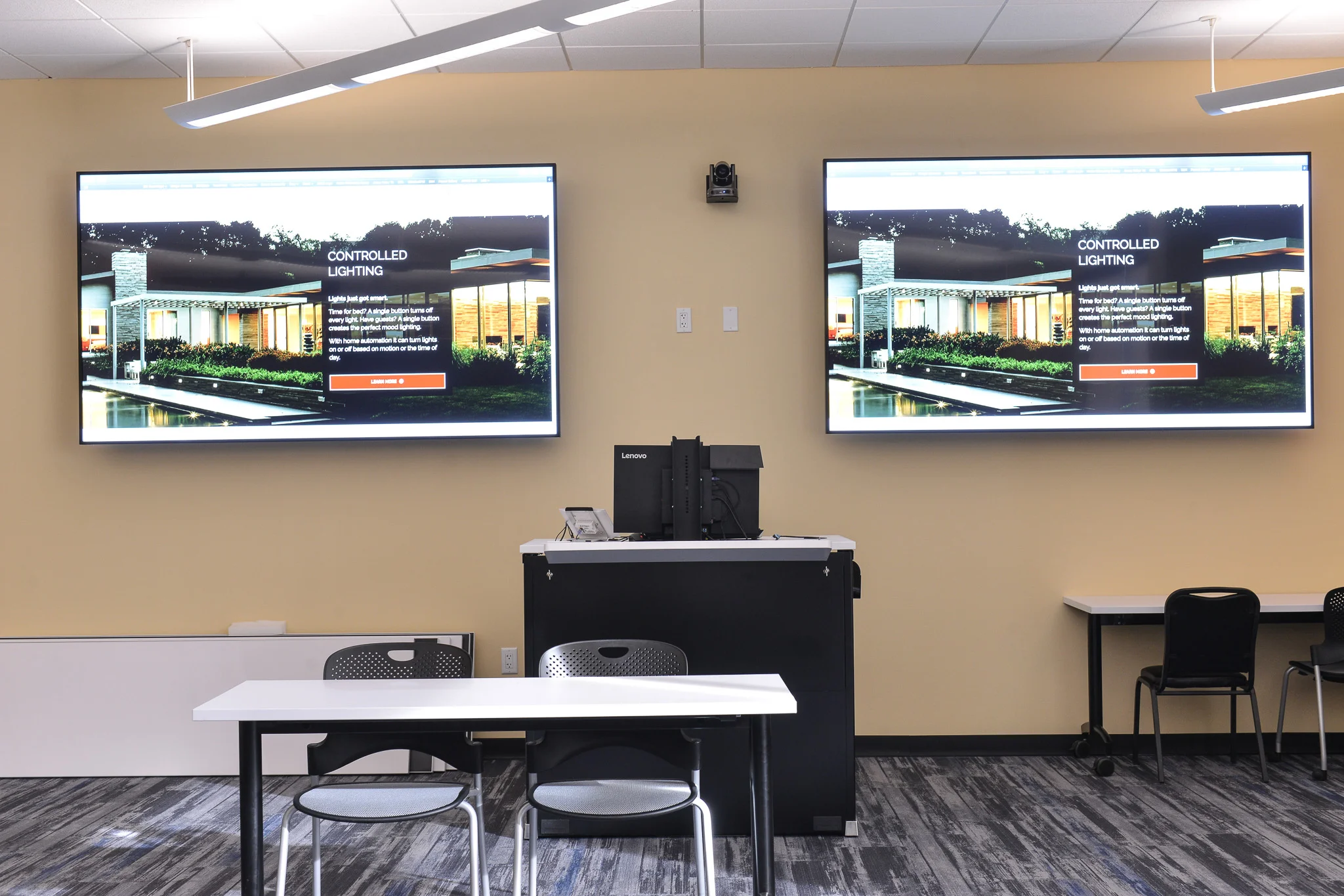Commercial conference room with integrated audio visual system installed by iQUARTERS