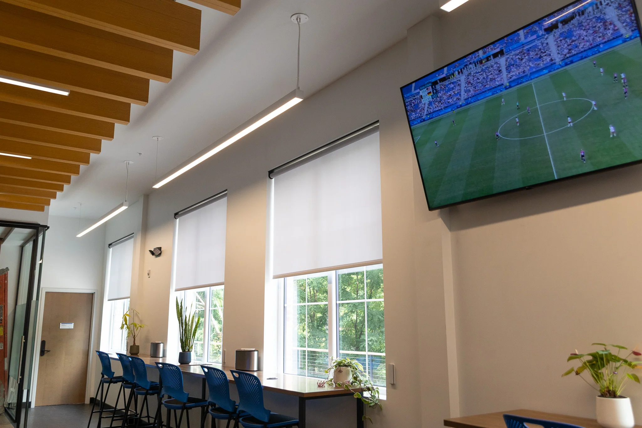 Luxury commercial meeting space with automated shades and audio video