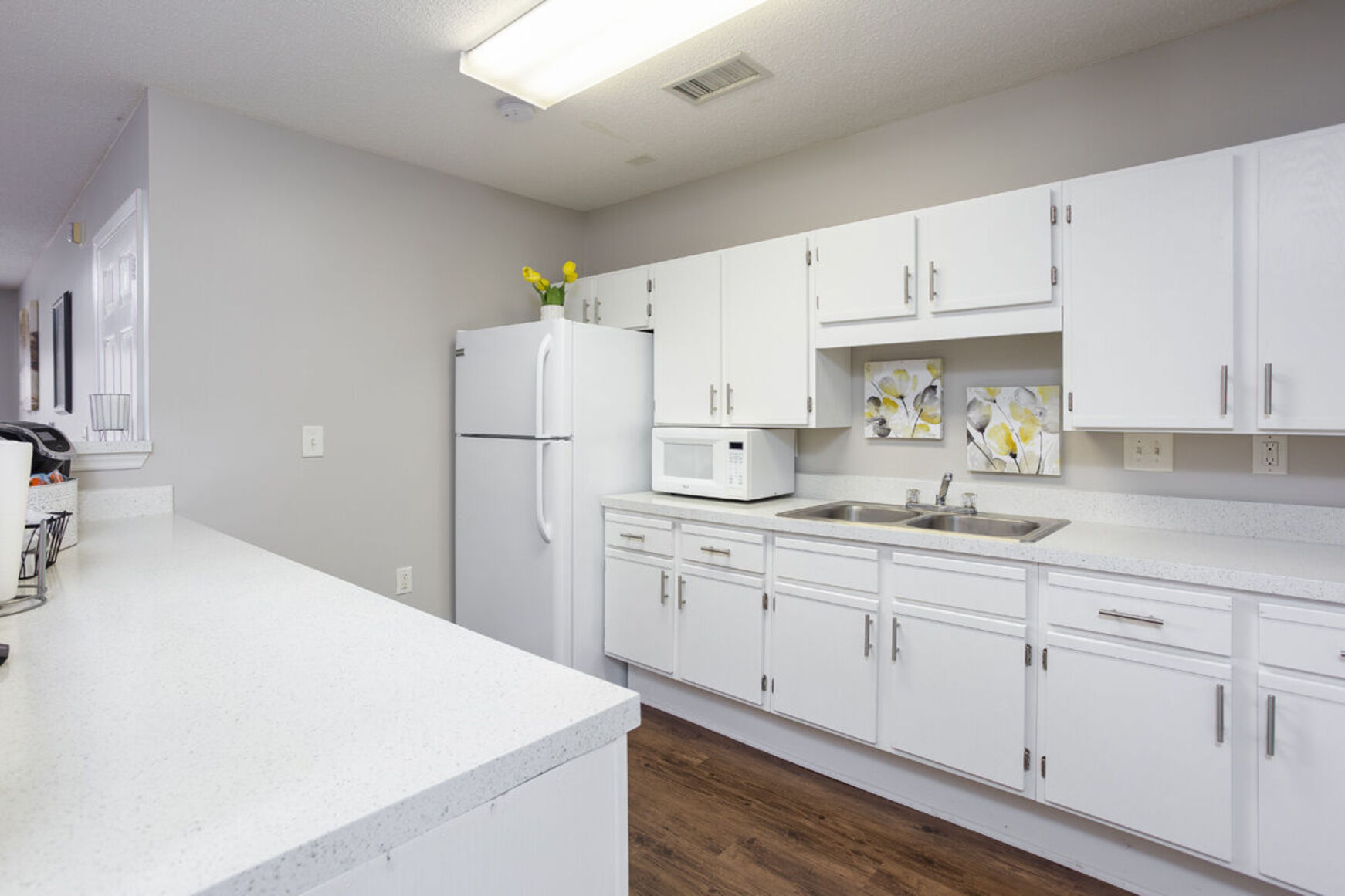 Clubhouse kitchen with white cabinets