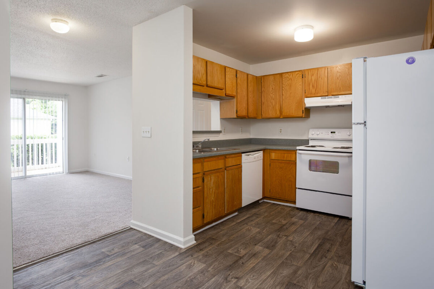 Kitchen with brown cabinets