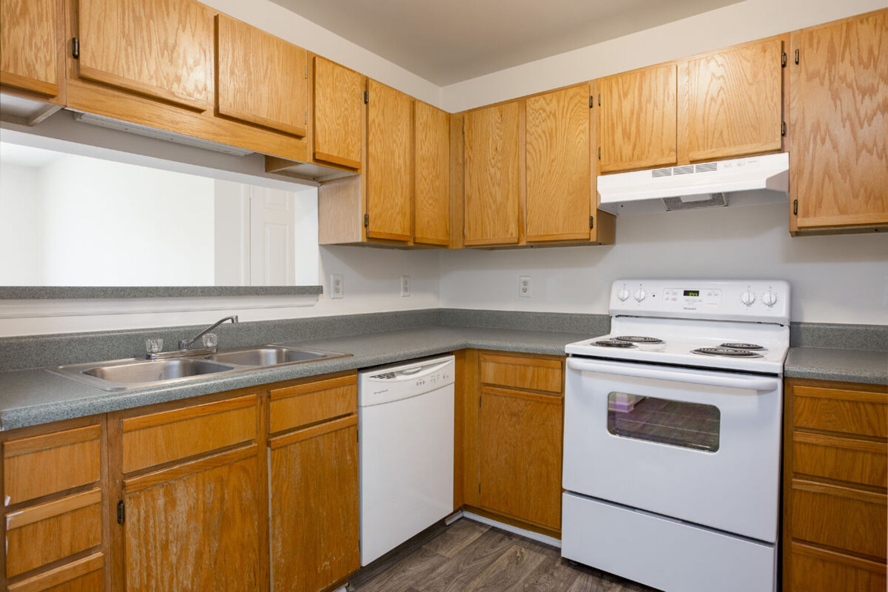 Kitchen with brown cabinets
