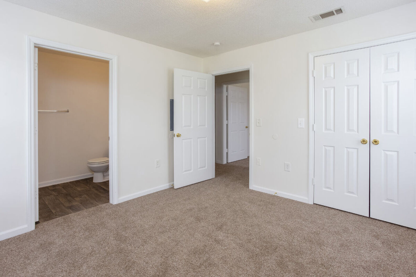 Bedroom with carpet