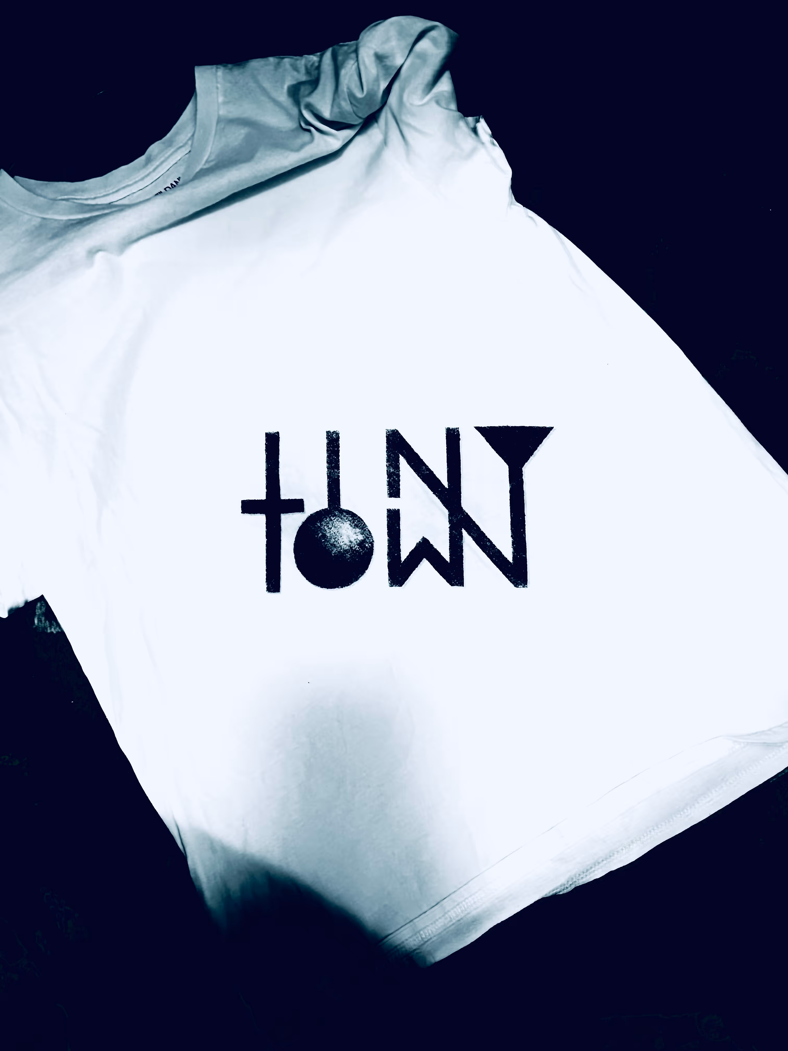 T-Shirt with stenciled on Tiny Town Logo
