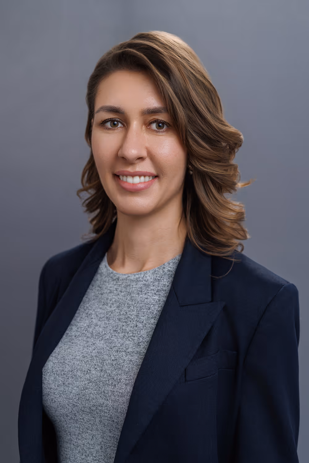 Portrait of Dr. Anna Gazu, experienced dentist delivering personalized and compassionate dental care