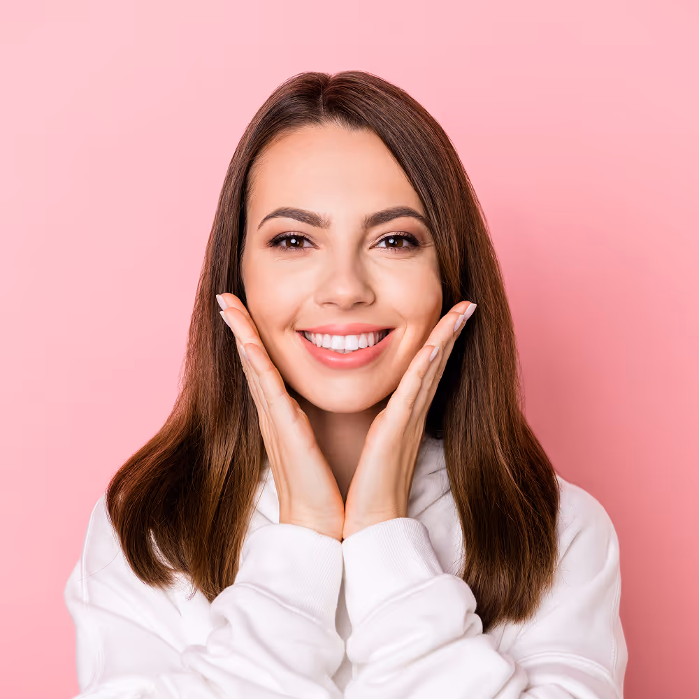 Patient receiving in-office teeth whitening treatment with advanced dental technology