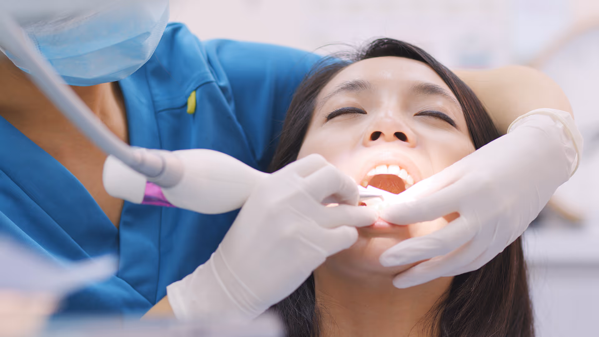 Scaling and root planing deep cleaning procedure in Clifton NJ removing plaque below gumline