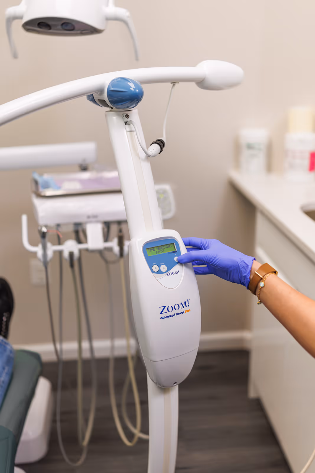 Patient receiving Zoom in-office whitening with advanced LED whitening system