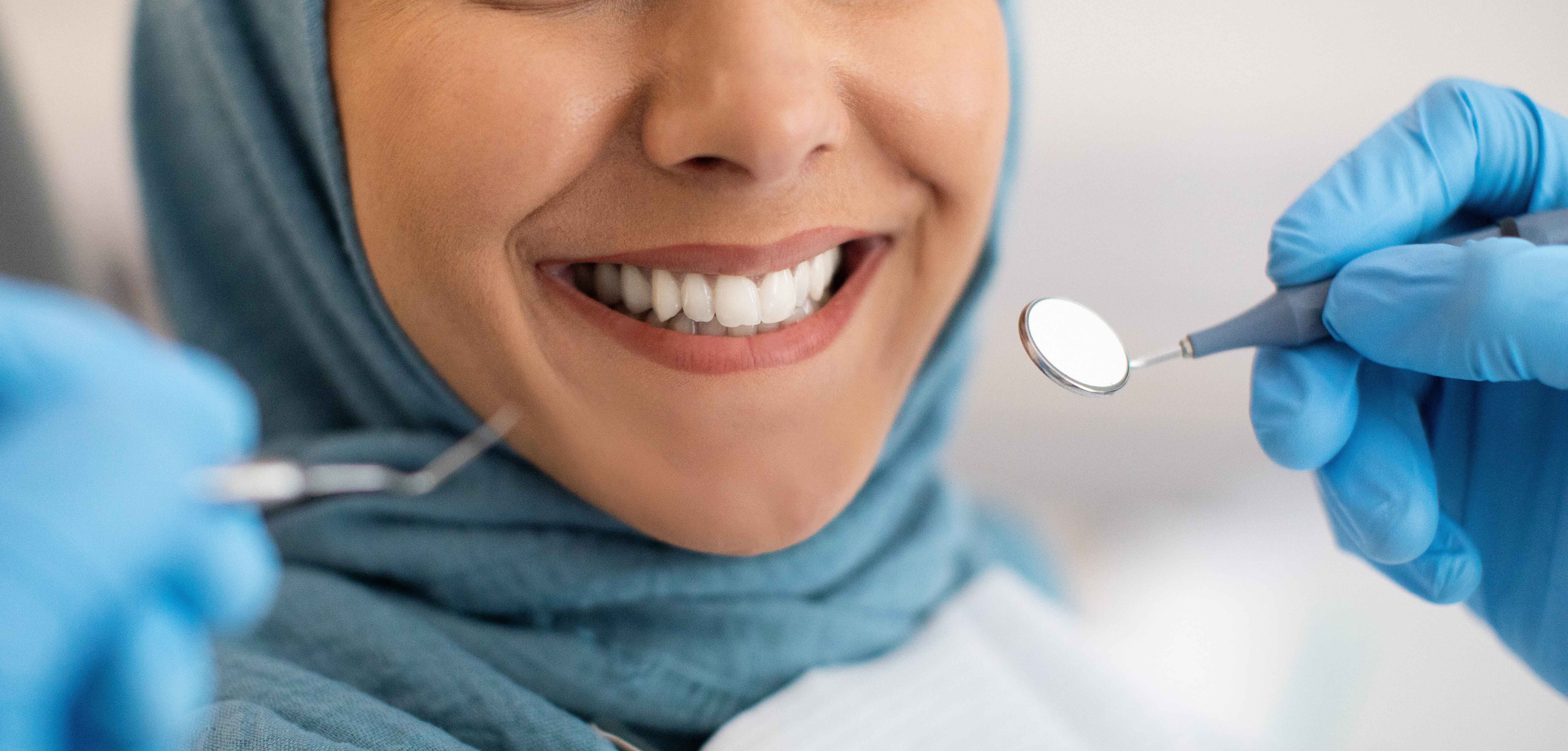 Close-up dental examination for personalized smile makeover planning in Clifton, NJ