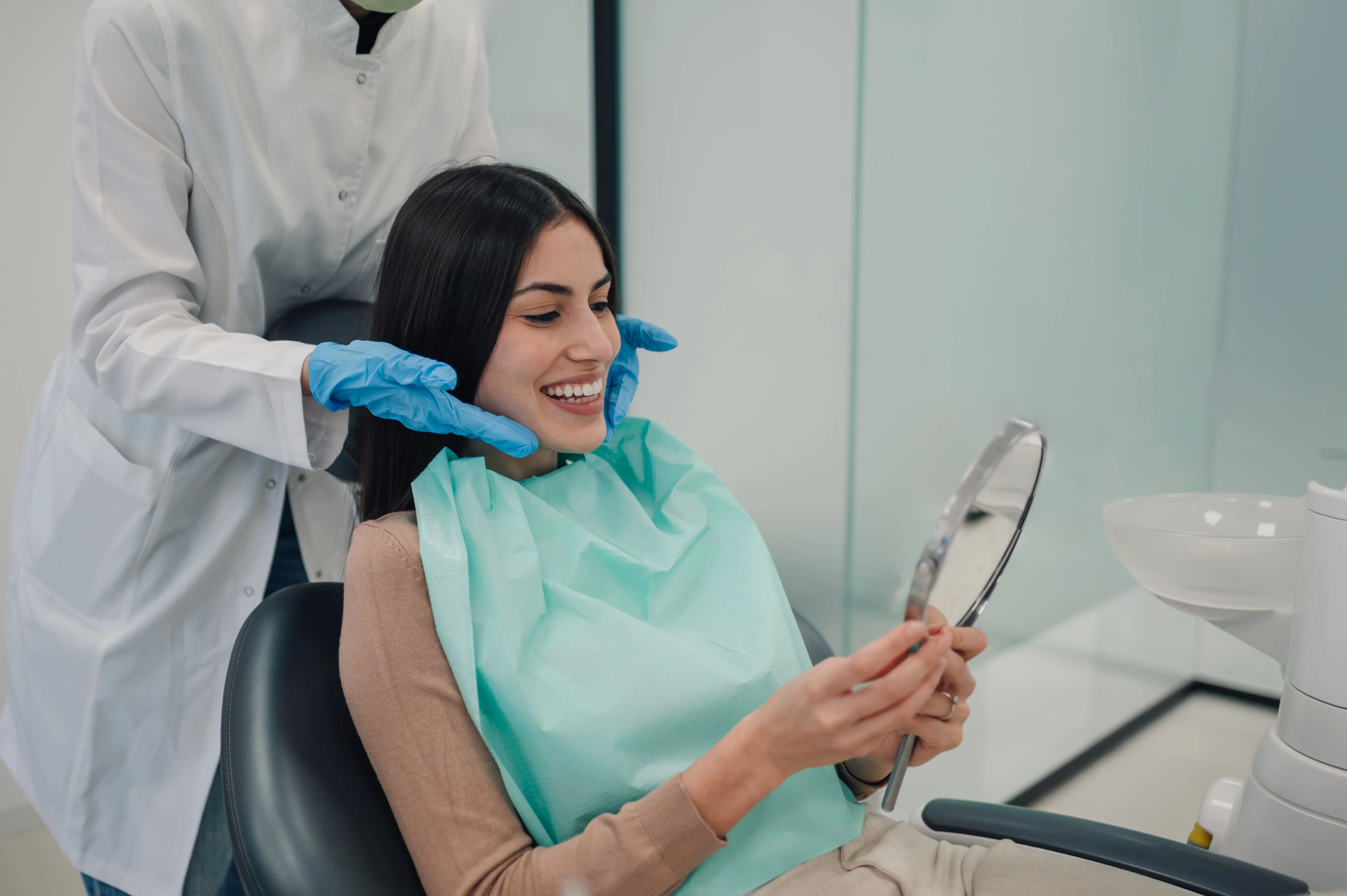 Patient viewing her smile during a digital dental consultation near Elmwood Park, NJ