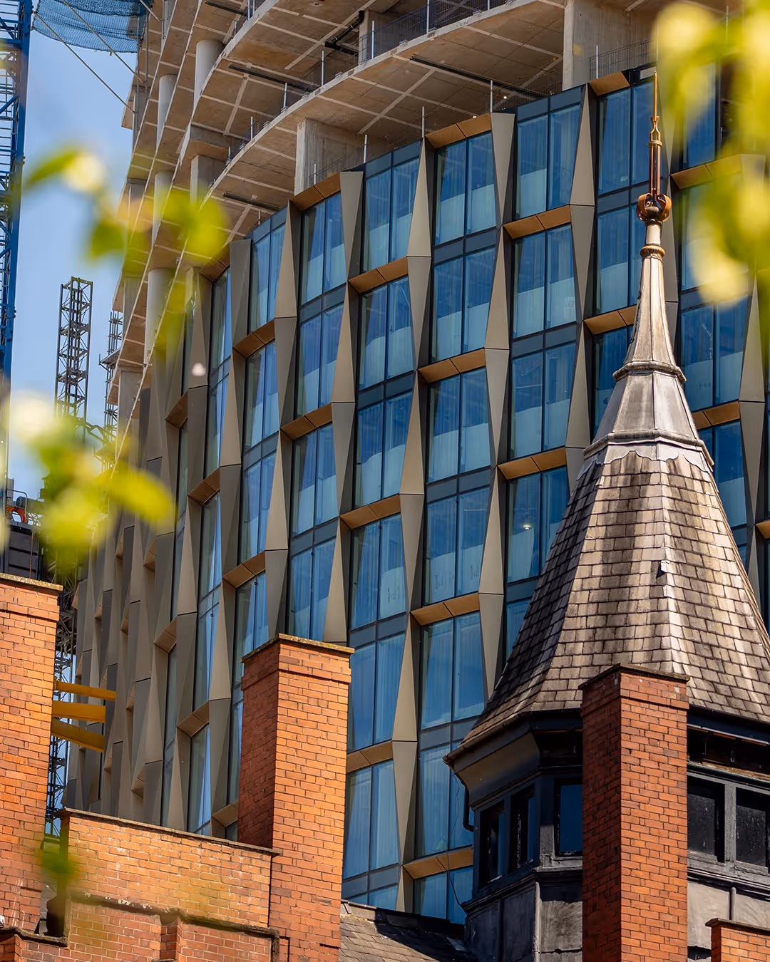 The new W1 building under construction in Manchester city centre a featuring anodised aluminium facade.