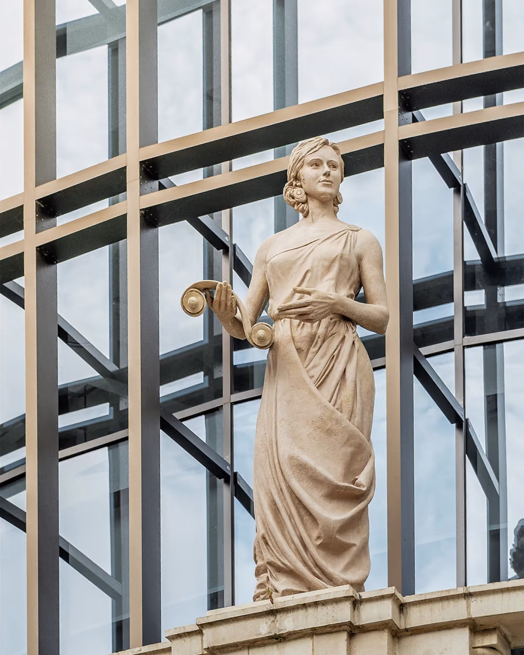 statue in front of building
