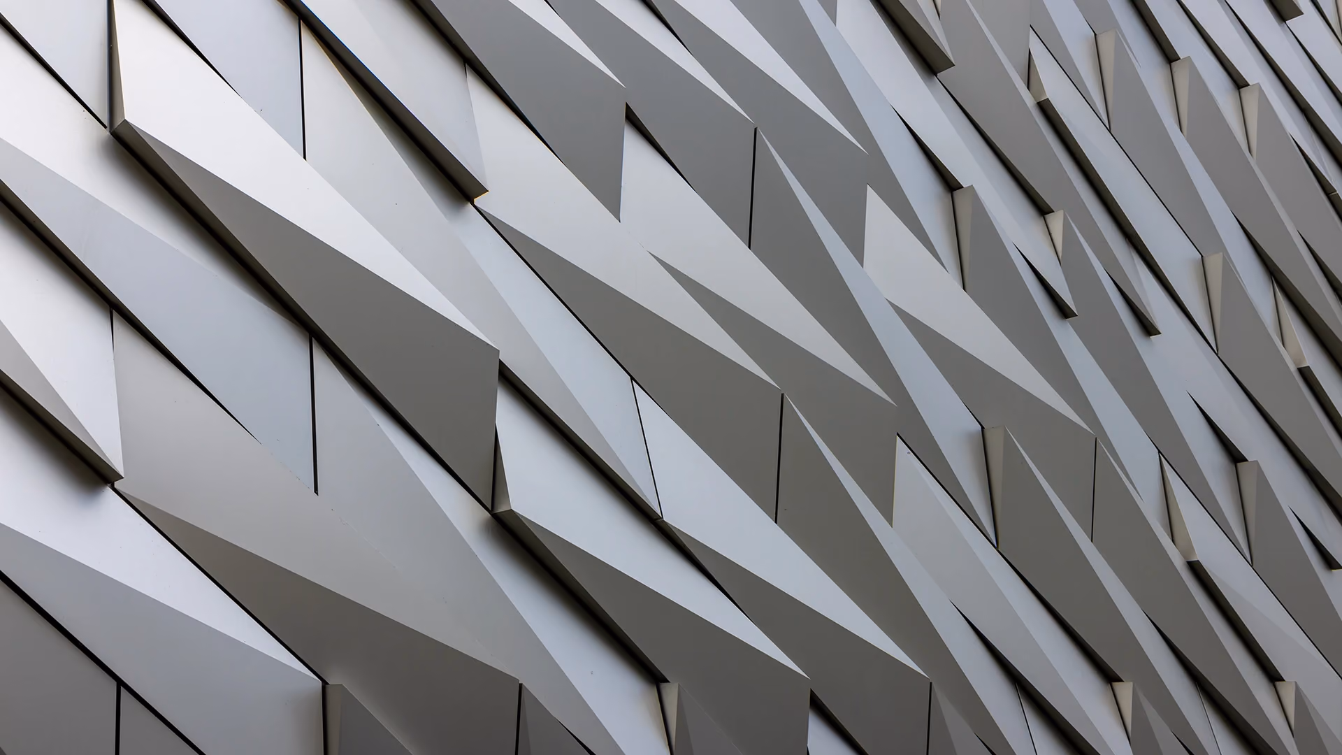 the Titanic Belfast's faceted natural-anodised hull forms are the definitive example of light playing across an anodised surface