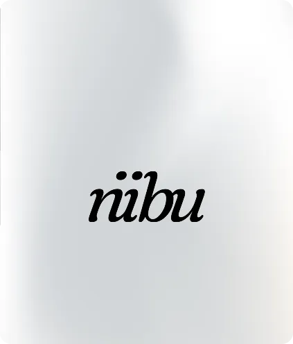 Black cursive text reading 'riibu' on a blurred white and gray background.