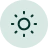 Icon of a sun with rays inside a blue-green circle.