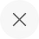Gray circular button with a dark gray X in the center.