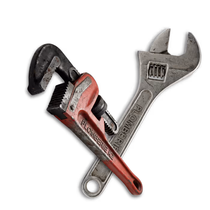 Crossed pipe wrench and adjustable wrench overlapping, both with the word 'PLOMBERIE' on their handles.