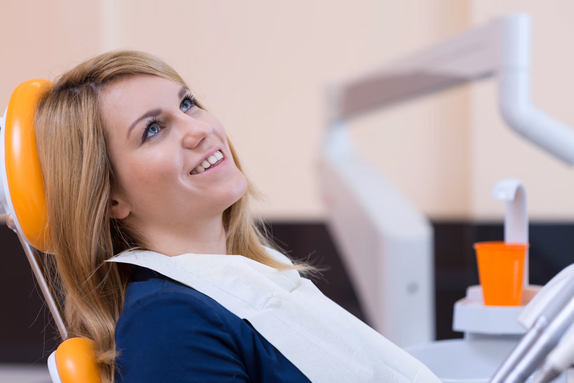 female patient waiting for the dentist to perform a dental procedure 