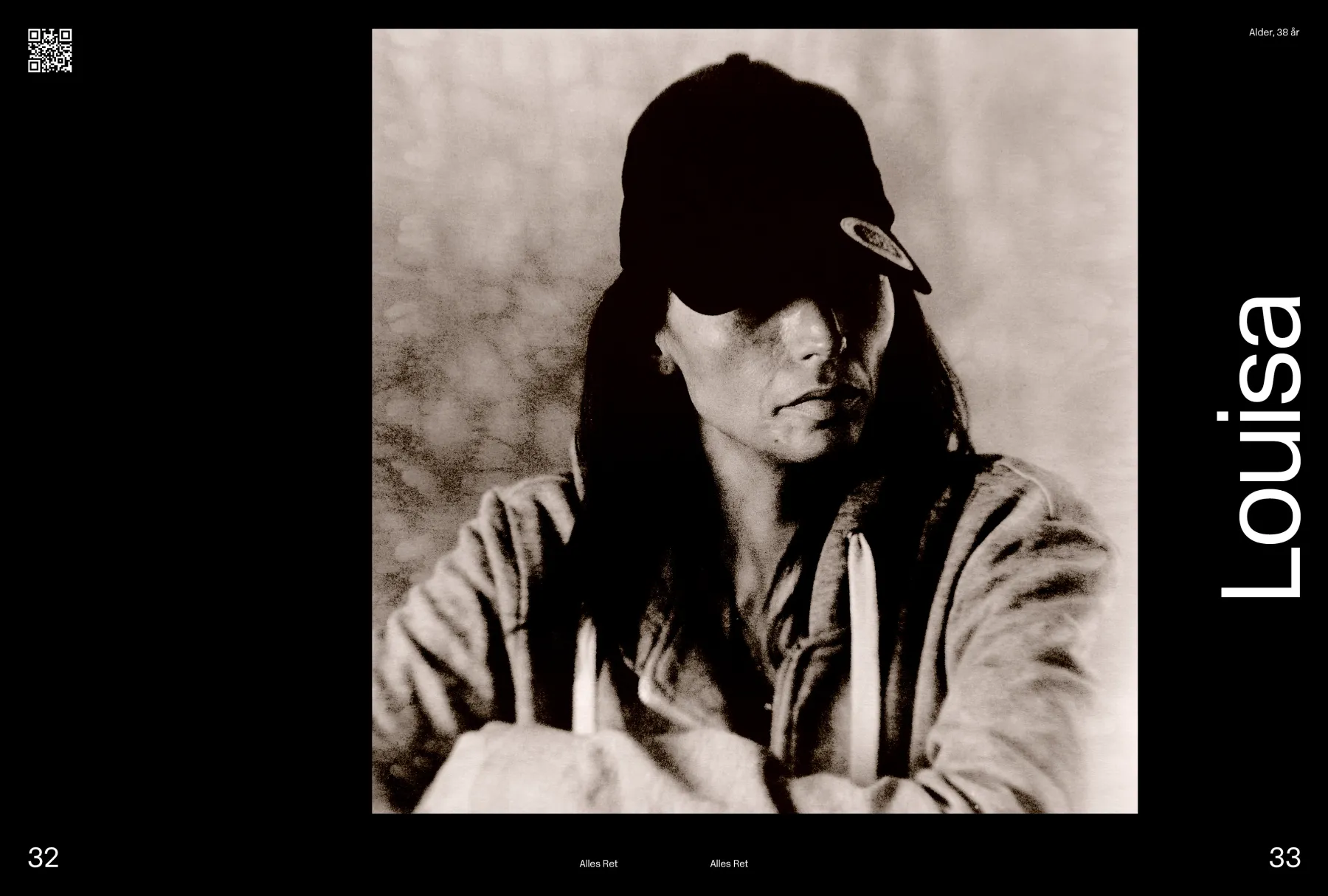 Black and white photo of a woman named Louisa wearing a baseball cap and hoodie with a serious expression.