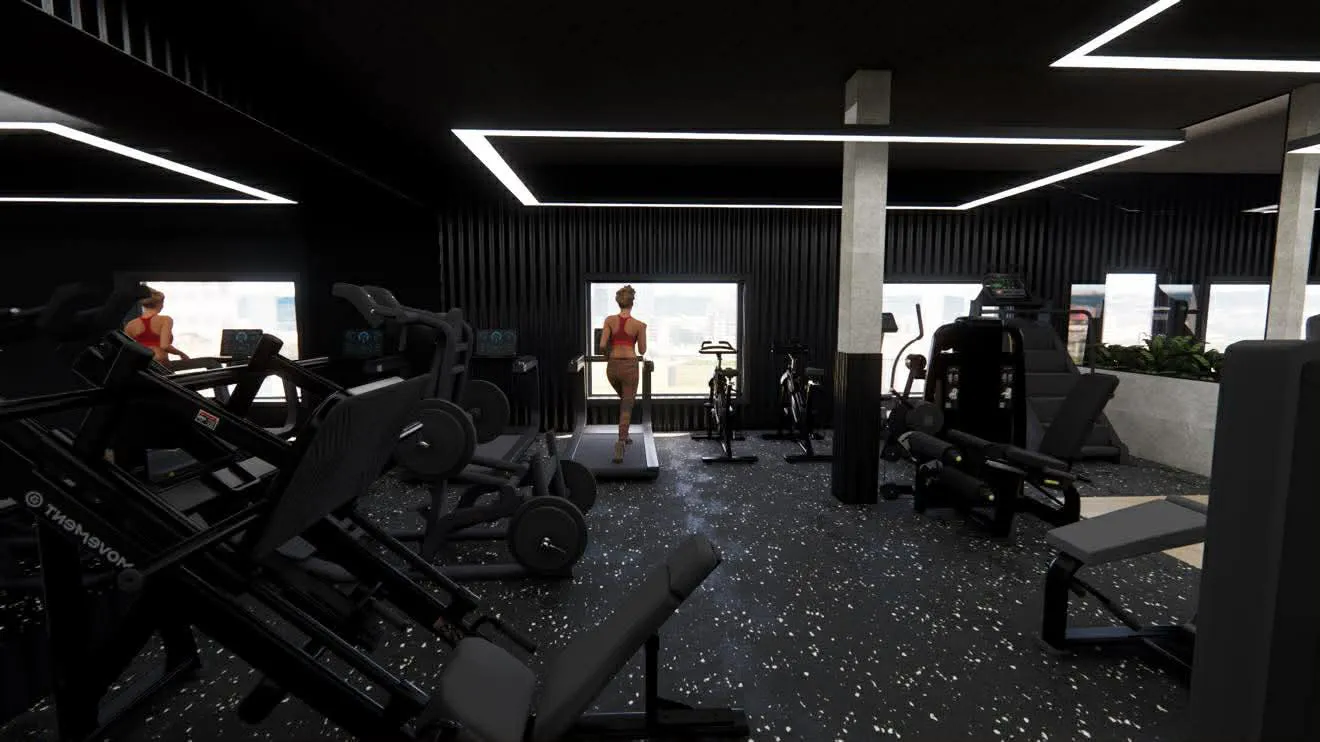 Femme en tenue de sport rouge courant sur un tapis roulant dans une salle de gym moderne avec machines d'exercice et vélos stationnaires.