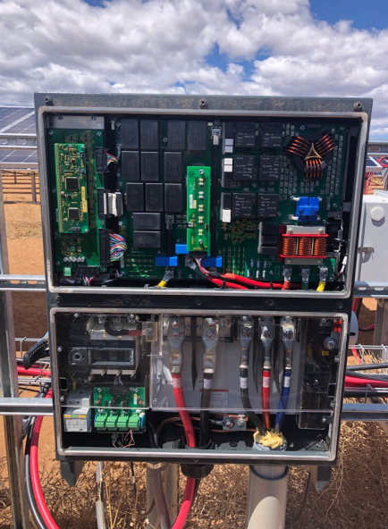 image of a technician installing solar panels