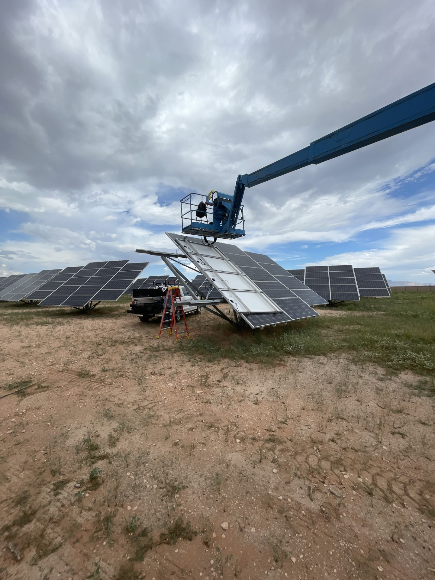 image of a technician installing solar panels