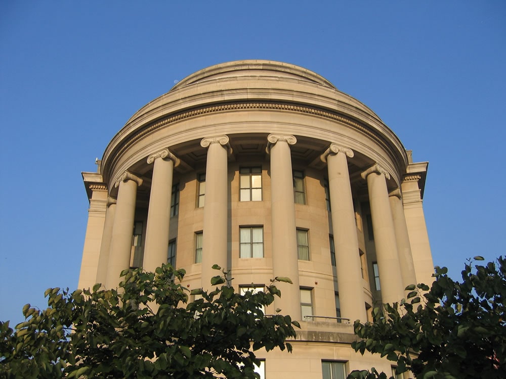 Picture of the FTC building in Washington, D.C, on a clear day with a blue sky.