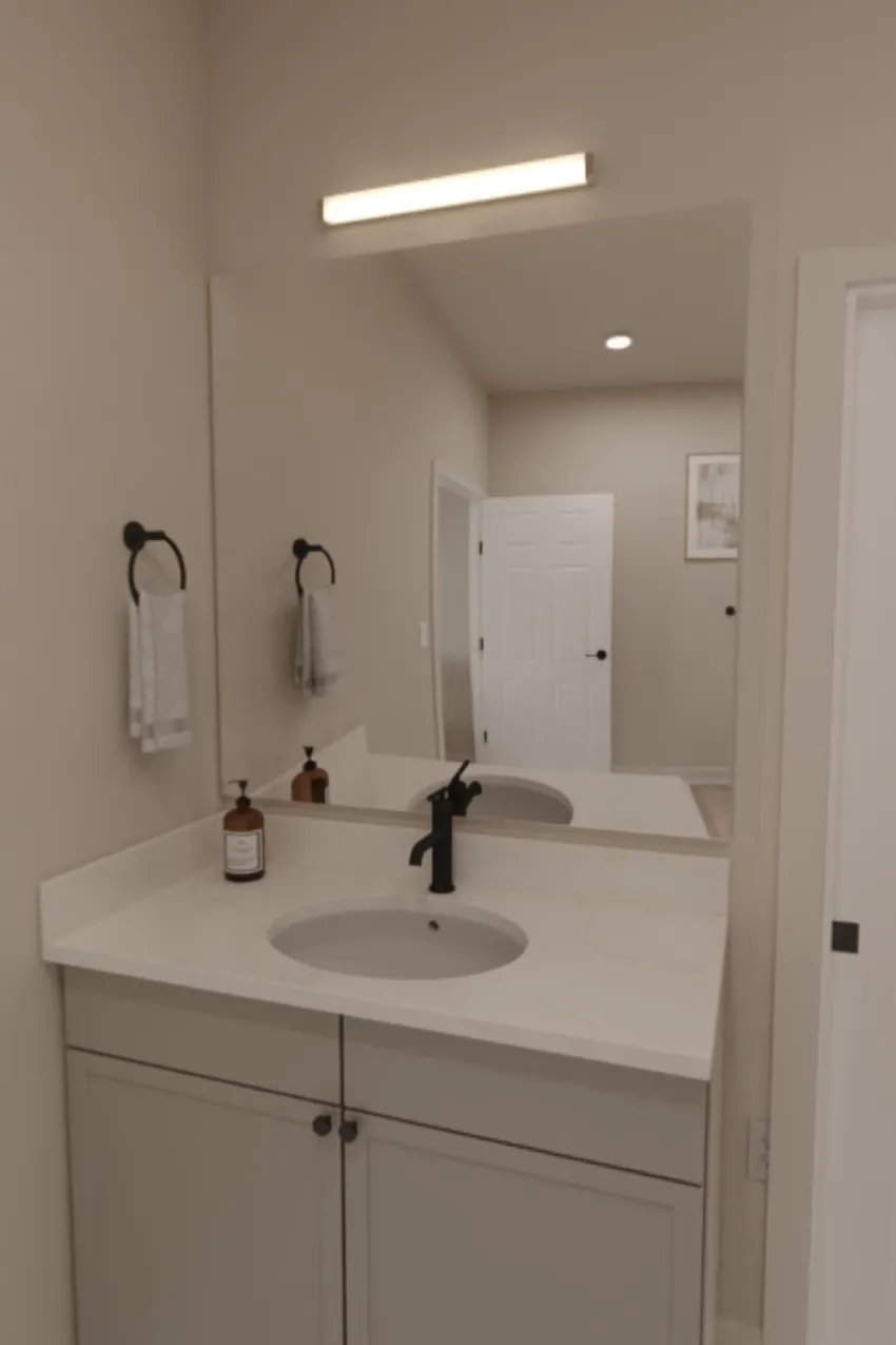 Rendering of a bathroom vanity with a white quartz top, black faucet, and wide mirror