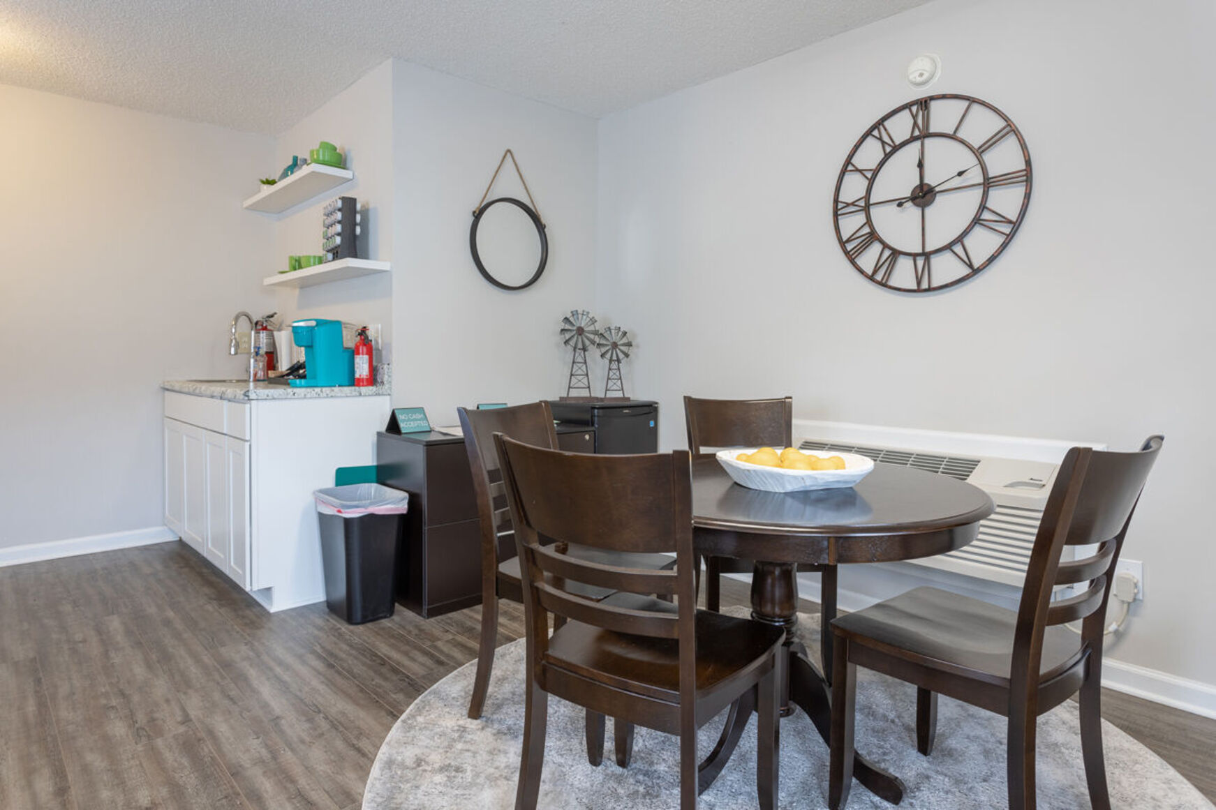 Dinning room with black chairs and table
